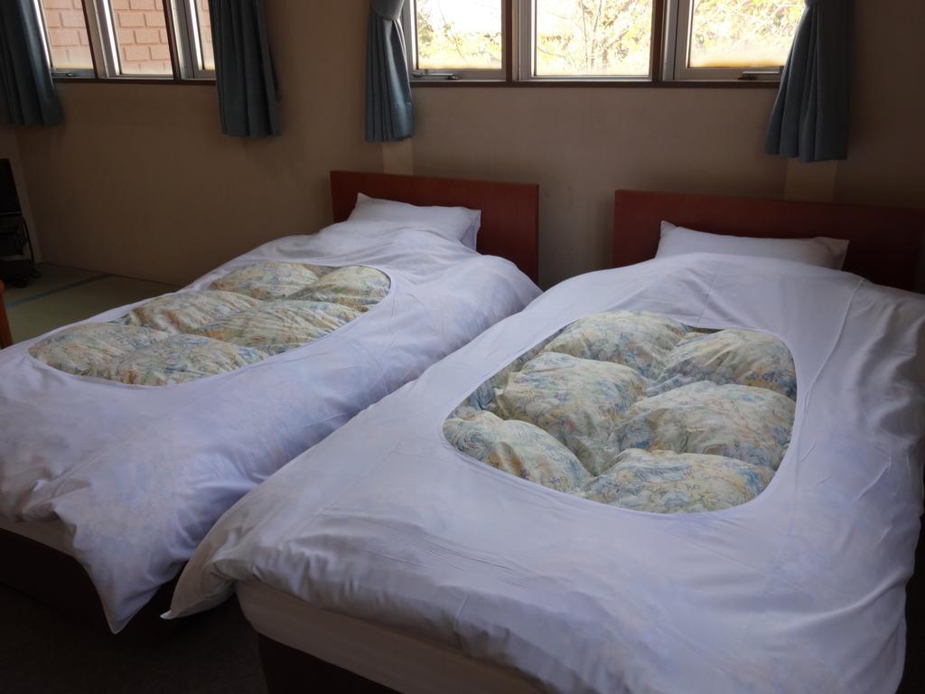 Oomukou Ryokan Hakuba Habitación foto